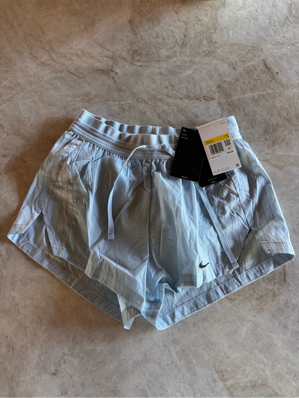 Nike Women's Pale Blue Pinstripe Athletic Shorts